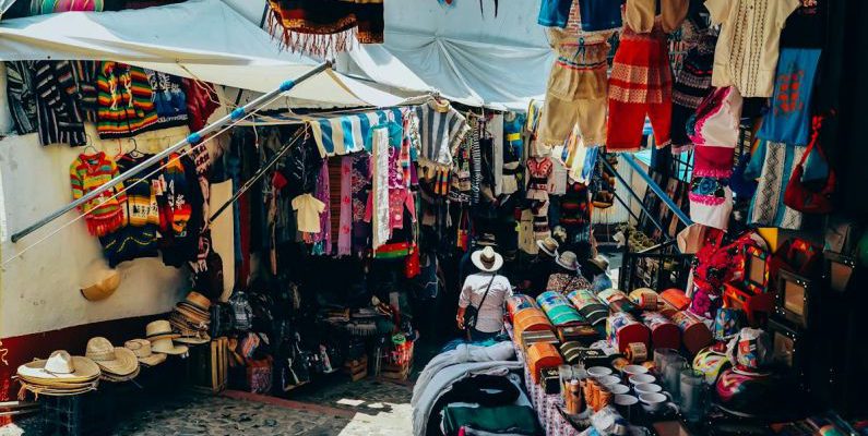 Flea Markets - Assorted-color Clothes Display on Street