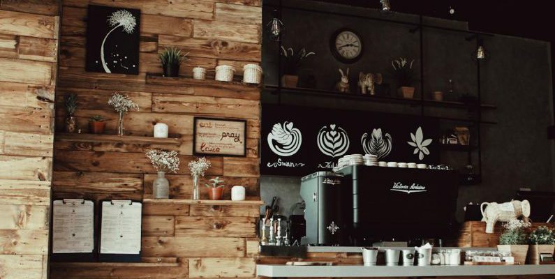 Coffee Shops - Assorted Decors With Brown Rack Inside Store