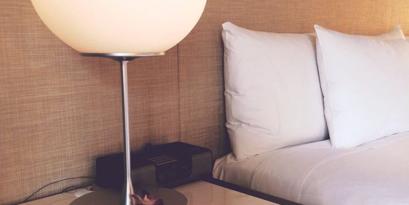 Lodging - Silver and White Desk Lamp Beside Bed