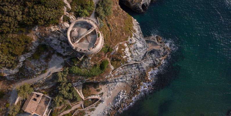 Castle - Aerial view of medieval fortress on green seashore