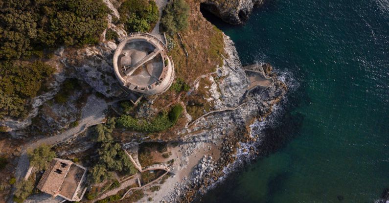 Castle - Aerial view of medieval fortress on green seashore