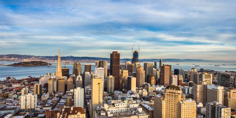 Area - High Angle View of Cityscape Against Cloudy Sky