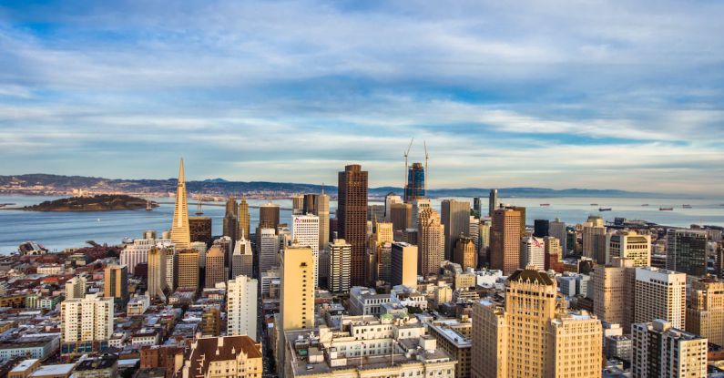 Area - High Angle View of Cityscape Against Cloudy Sky