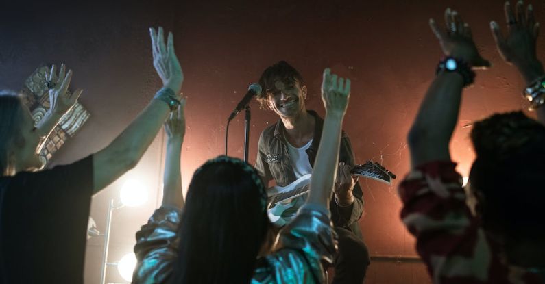 Bar Hop - Women Raising their Hands while Dancing
