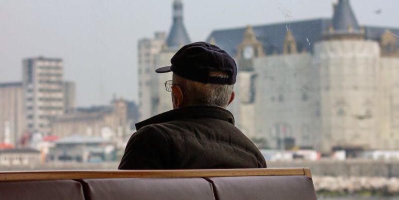 Riverboat - An Eldery Man Travelling on a River Boat