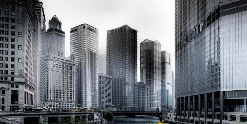 River Cruise - Photo of Boat Going Through River in Between Highrise Buildings
