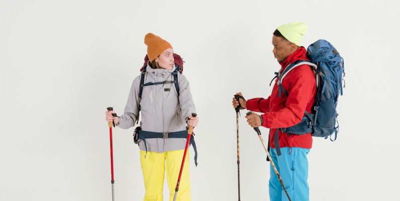 Hiking - Two People in Complete Trekking Gears