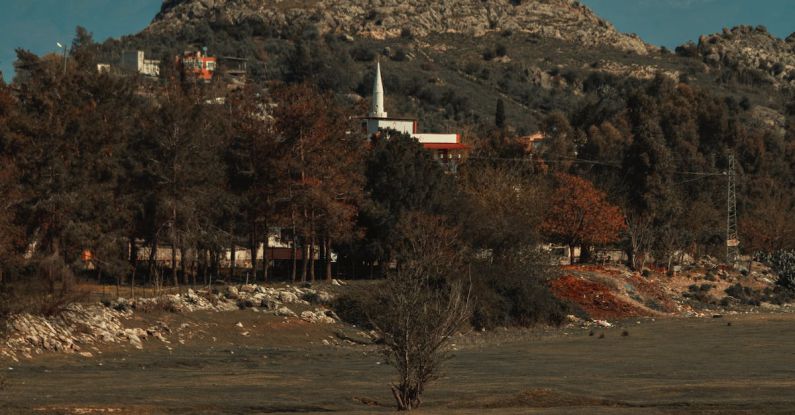 Villages - A castle on a hill overlooking a body of water
