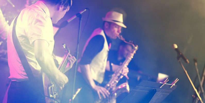 Live Music - Man Playing Saxophone
