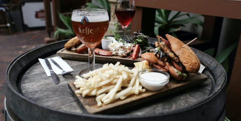 Beer - Close Up of Meal and Drinks on Table
