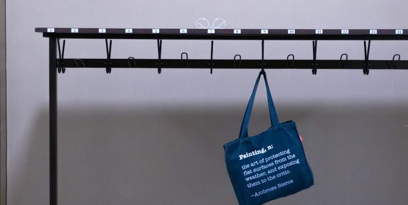 Vinohrady - blue tote bag hanging on black metal bar