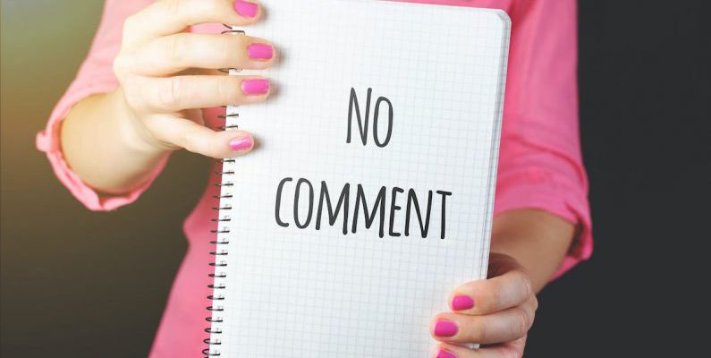 Secrets - Woman Holding No Comment Signage